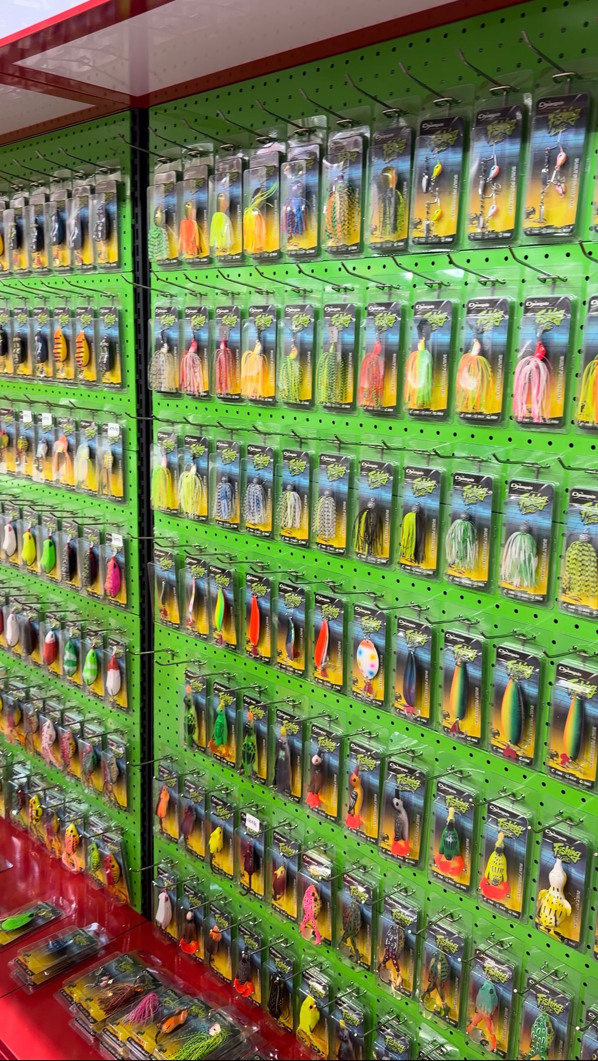 Packaged fishing lures on the YBB exhibition wall